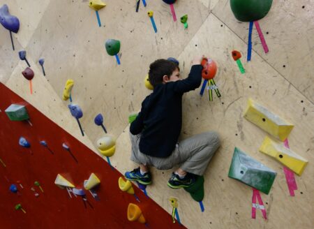child rock climbing
